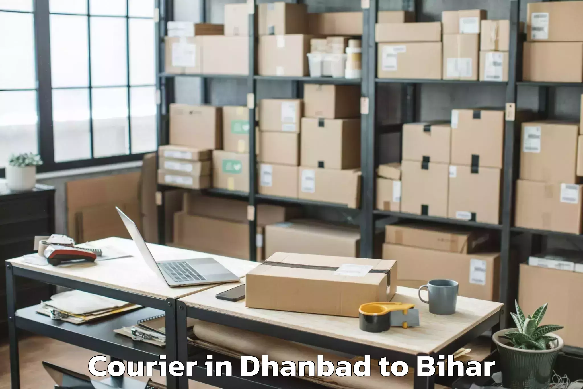 Easy Dhanbad to Ghoghardiha Courier Booking